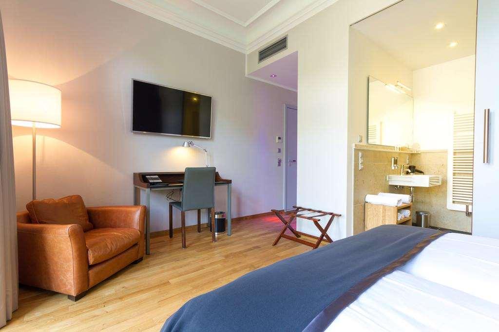 Qube Hotel Bahnstadt Хайделберг Стая снимка