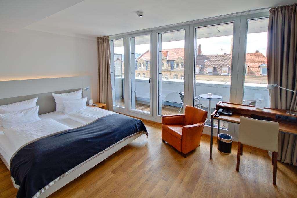 Qube Hotel Bahnstadt Хайделберг Стая снимка